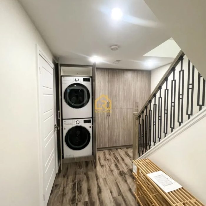 basement laundry room in milton